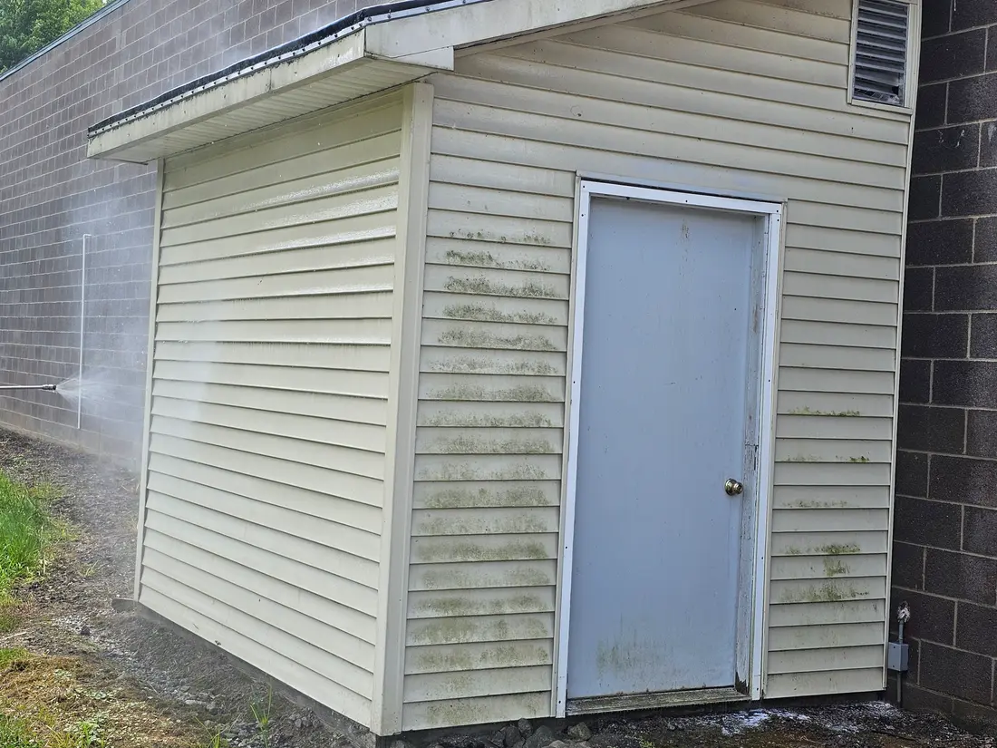 Before: Green-streaked vinyl shed before and after washing